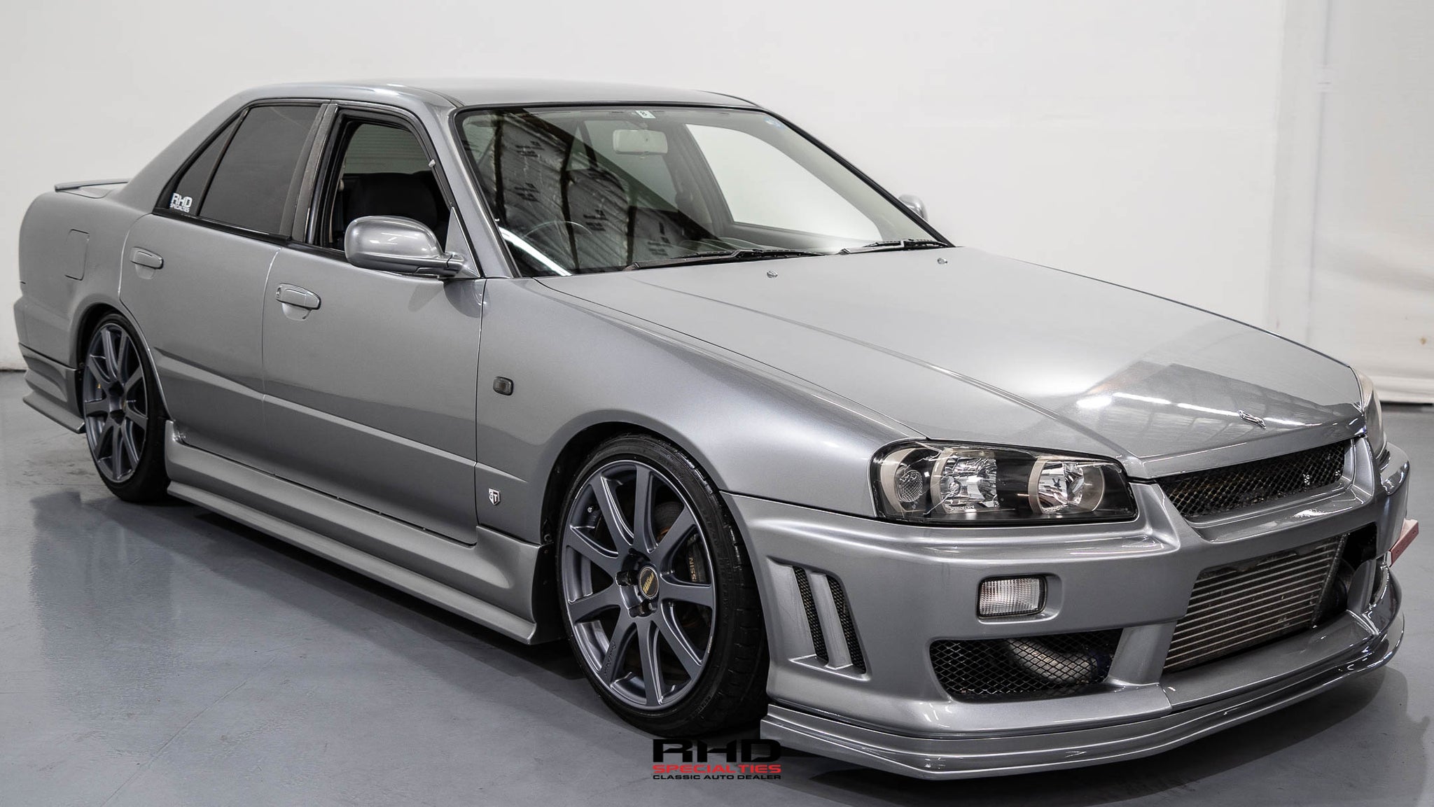 Nissan Skyline GT-R R34 シルバー 1998 Nissan Skyline R34 GTT Sedan (WA) *SOLD* – RHD Specialties LLC